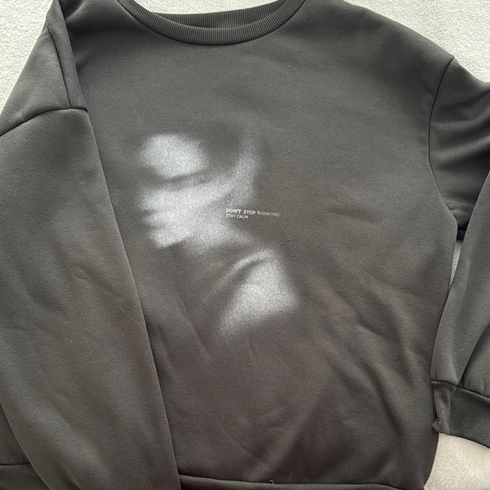black graphic sweater